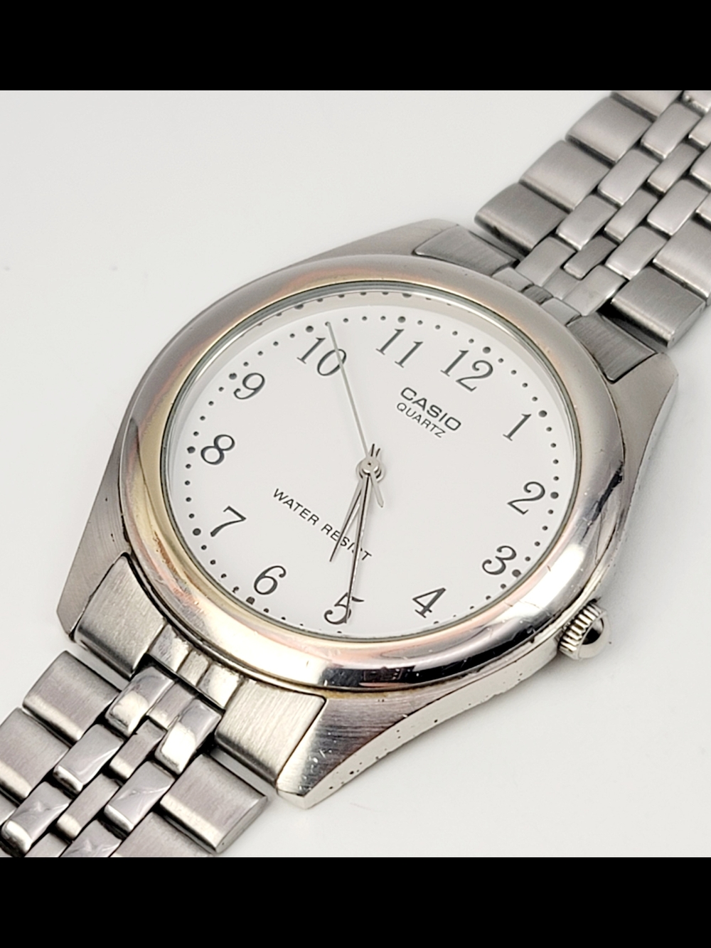 Casio MTP-1129 Men’s Quartz Watch White Dial Stainless Steel Bracelet